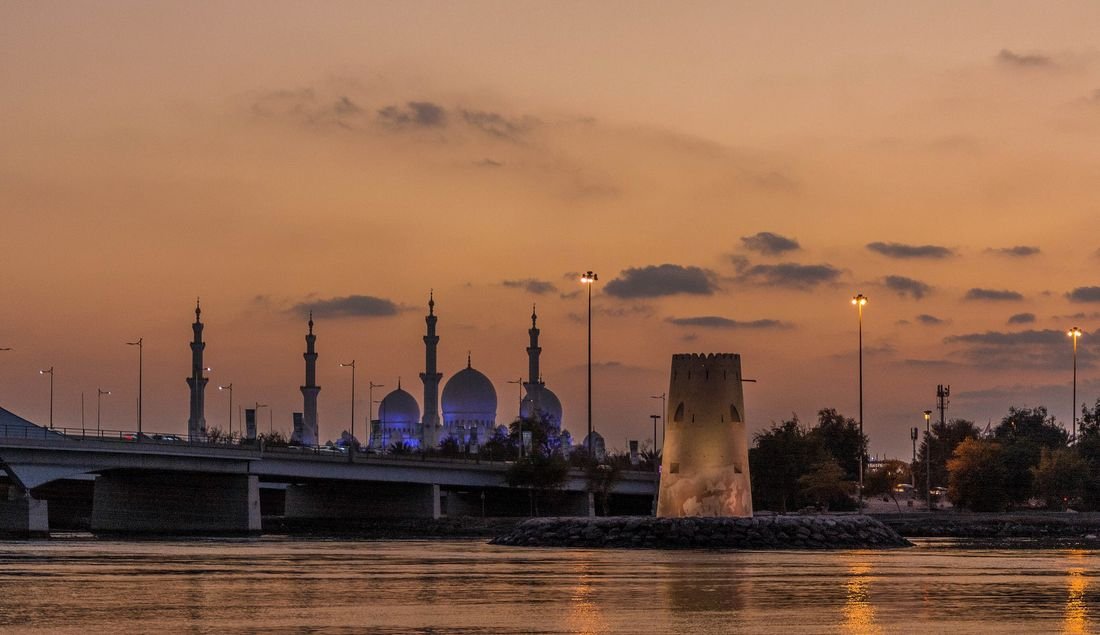 White domes and minarets of the Sheikh Zayed Grand Mosque in Abu Dhabi