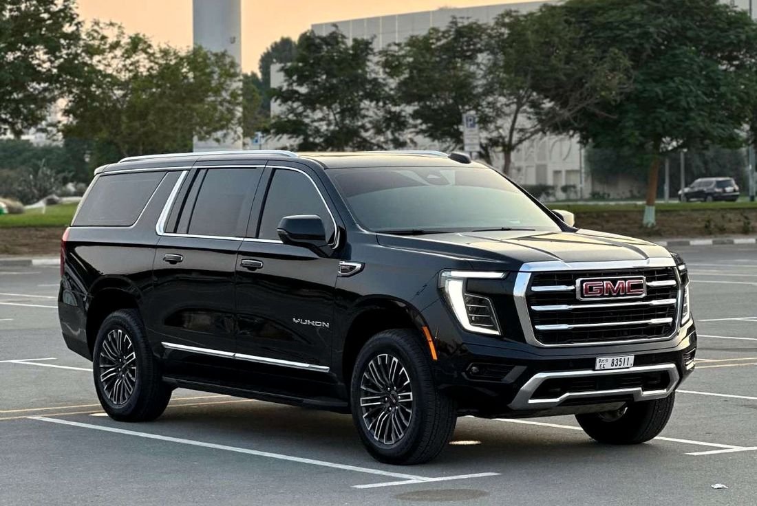 Black GMC Yukon parked and ready in a car park